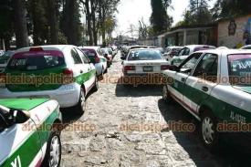 Xalapa, Ver., 15 de febrero de 2026.- En la prolongaci�n Villahermosa, taxistas integrantes del Movimiento Nacional Transportista se reunieron para hablar de la nueva plataforma ?MXTaxi?, con la que buscan competir contra Uber e InDriver.
