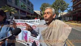 Xalapa, Ver., 26 de febrero de 2026.- Grupo de vecinos marcharon por la avenida �vila Camacho con direcci�n al centro de la Capital. Protestan por despojo de terrenos en el Fraccionamiento Las Minas.